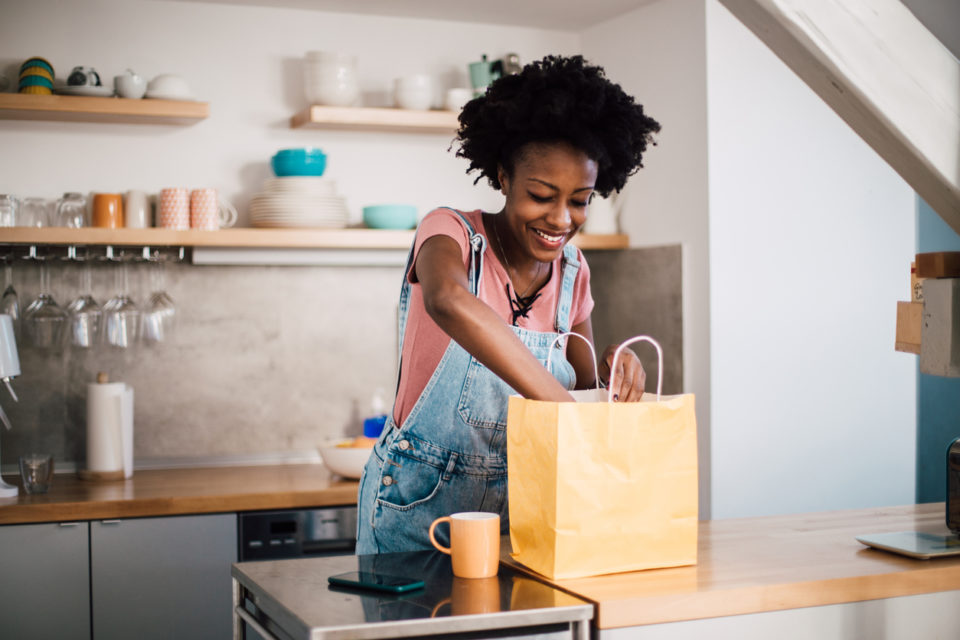 woman unpacking her to go food