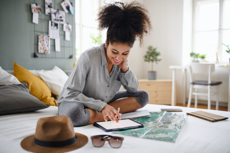 young woman making travel plans